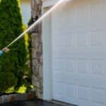 spraying a garage door