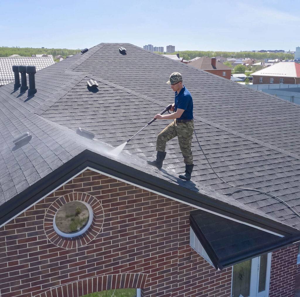PROP WASH spraying grime off roof
