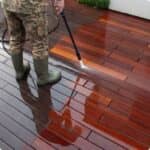 man washing natural wood