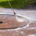 spraying outdoor patio