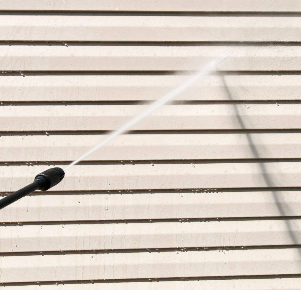 vinyl siding on commercial building pressure washed