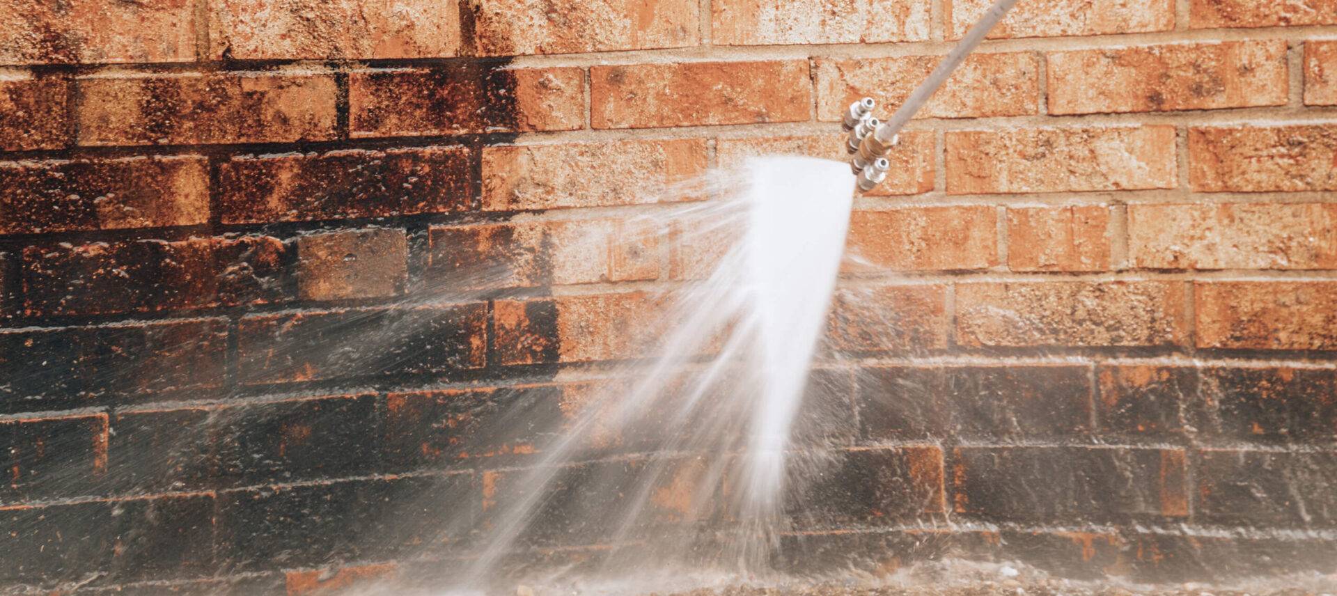 power washing grime off brick