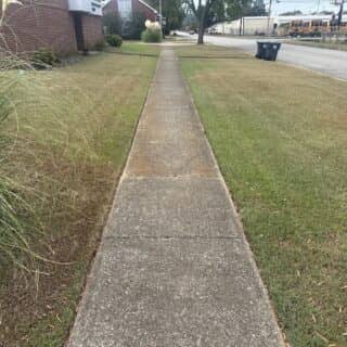 before sidewalk power washed